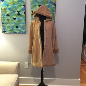 NWOT Genuine Leather Jacket with faux fur lining.